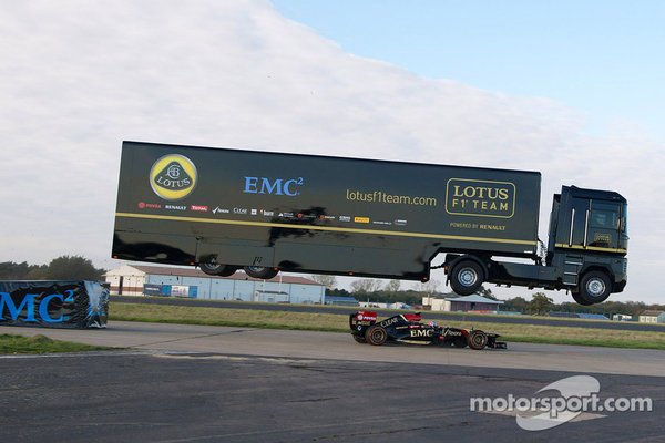 f1-lotus-transporter-jumps-f1-car-2014-stunt-truck-driver-mike-ryan-jumps-over-stunt-drive.jpg